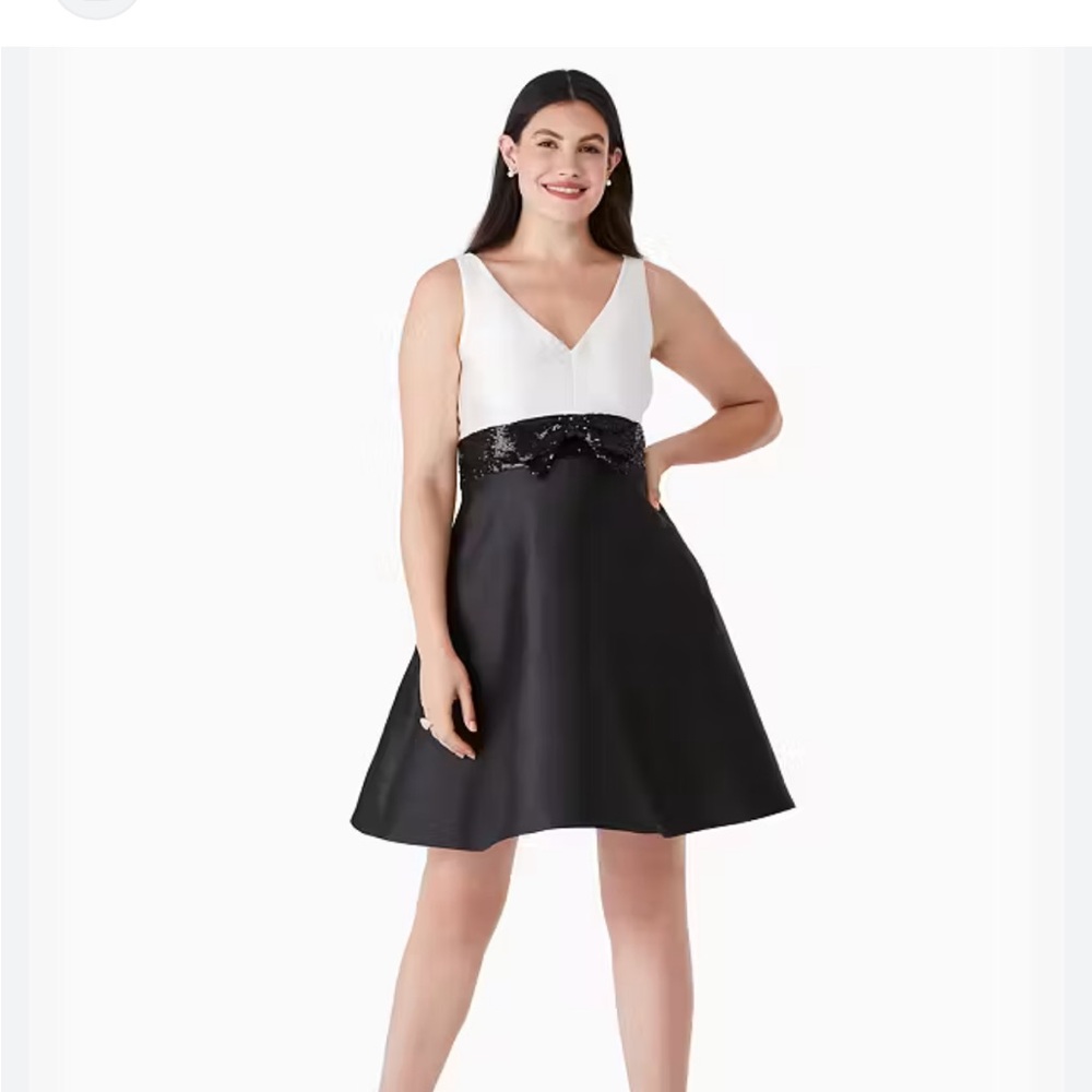 Kate spade dress fit size 14. I paid full price and never wore